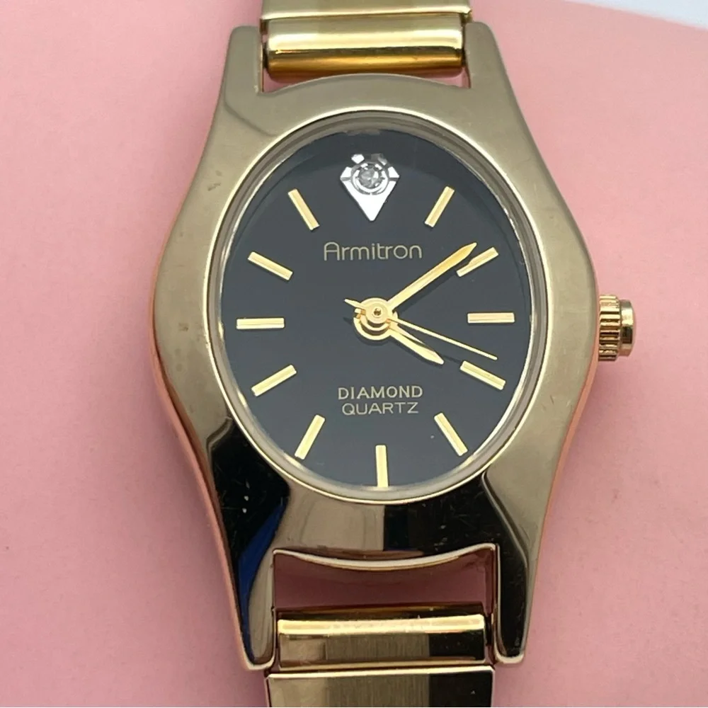 Armitron Diamond Quartz Gold Tone Stretch Watch Black Dial New Battery